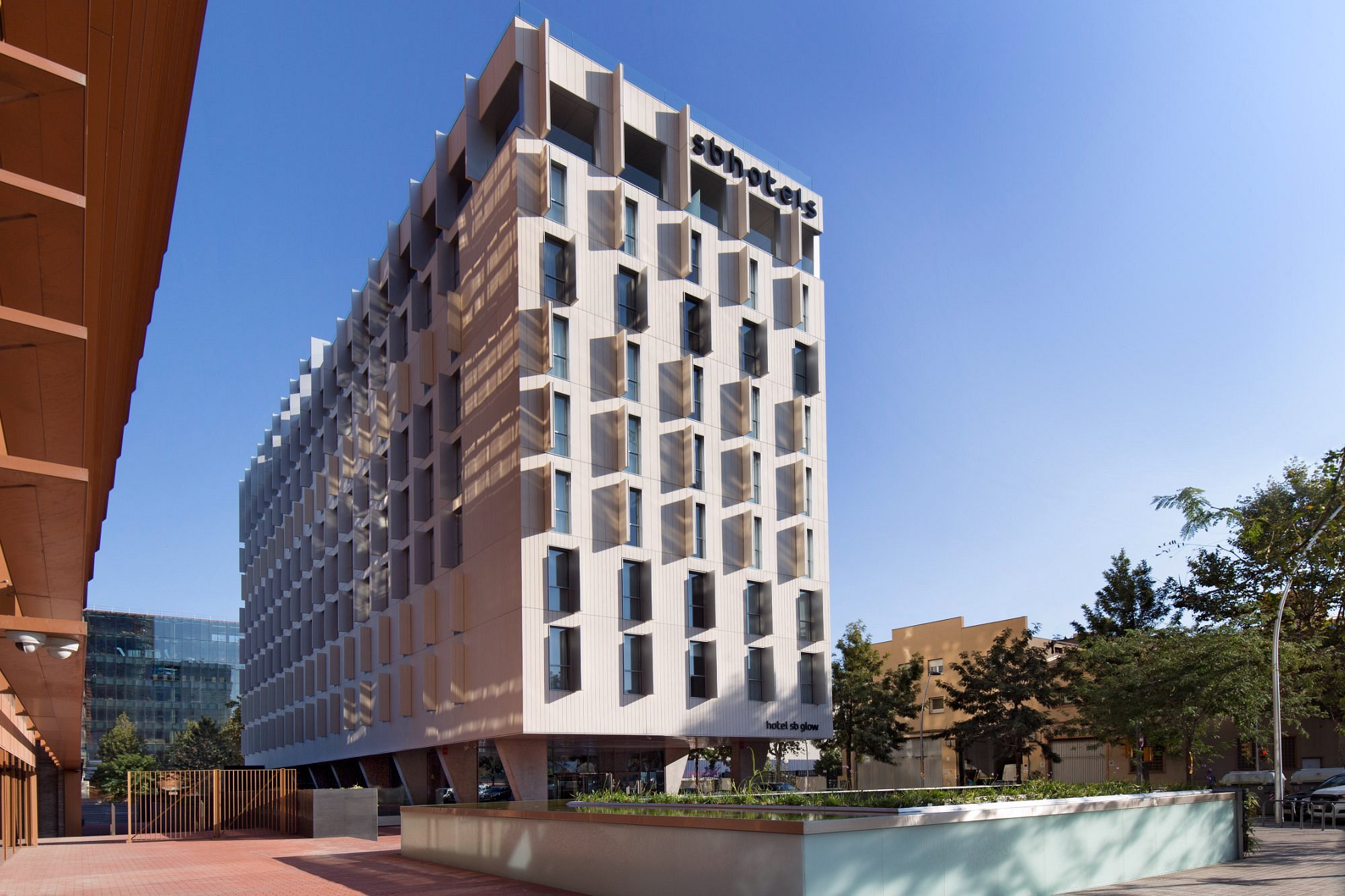 View of SB Glow Hotel building