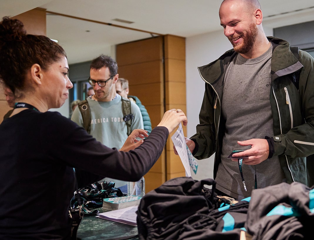 Image of person viewing booth at Nextflow Summit